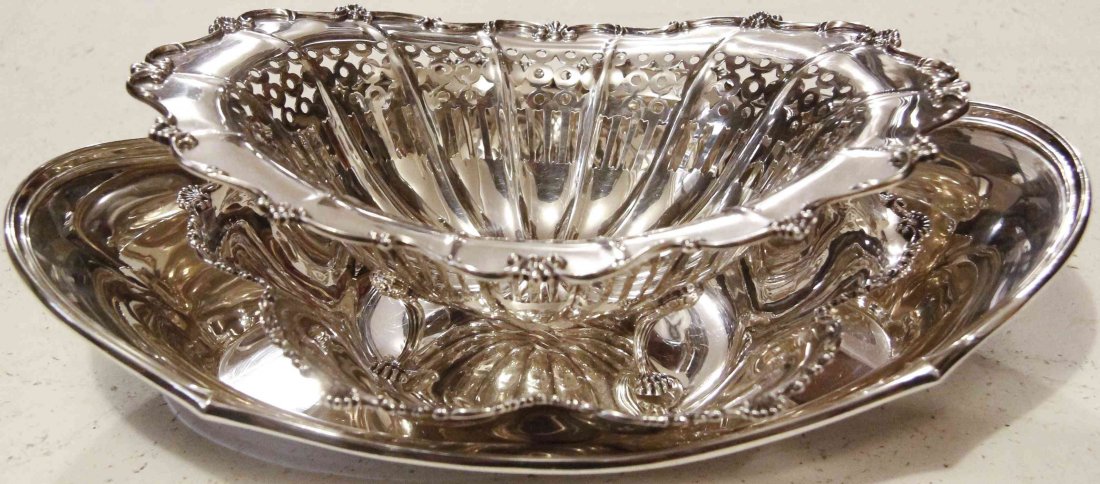 Three American Silver Bowls, Width of widest 10 7/8: Three American Silver Bowls, one oval example, Dominick & Haff, a footed reticulated example, Towle Silversmiths and one floriform bowl, Duhme Mfg. Co.; 22 ozt 4 dwt. Width of widest 1
