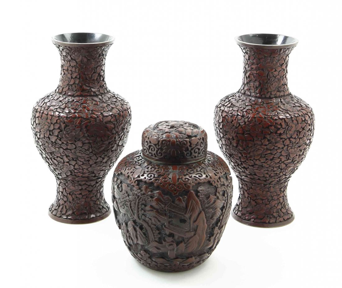 Three Chinese Cinnabar Articles, Height of first 6 3/4: Three Chinese Cinnabar Articles, comprising a ginger jar and two vases, the latter two marked China. Height of first 6 3/4 inches. Property from the Adrienne Krumhorn Trust, Highland Park, Illinois