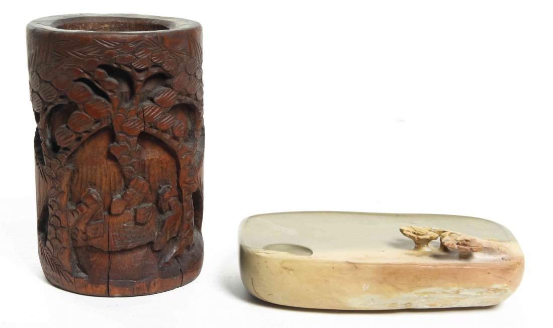 A Chinese Inkstone, Width of first 5 1/4 inches.: A Chinese Inkstone, together with a carved bamboo brush pot. Width of first 5 1/4 inches. Property from the Estate of Benjamin and Louise Pritz, Cincinnati, Ohio