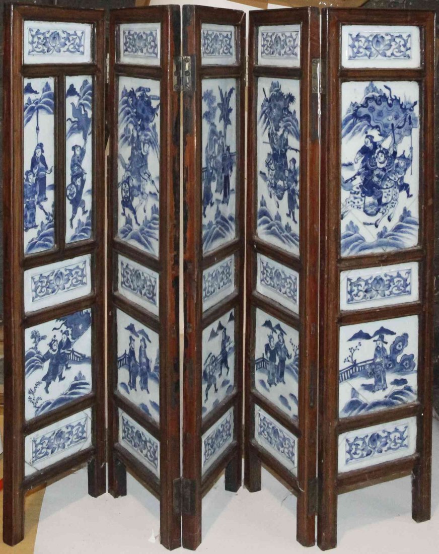 A Chinese Four-Panel Floor Screen, Height 28 inches.: A Chinese Four-Panel Floor Screen, having inset floor screen panels decorated with figures and scrolling lotus vines in underglaze blue. Height 28 inches.