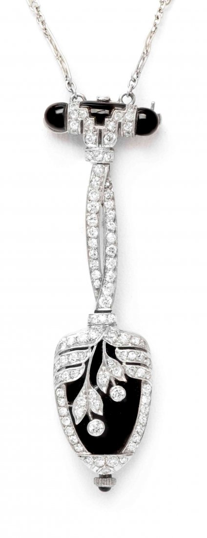 An Art Deco Platinum, Onyx and Diamond Watch Pendant,: An Art Deco Platinum, Onyx and Diamond Watch Pendant, Audemars Piguet, consisting of a top section accented with three calibre cut onyx sections suspending the interwoven bar joint and spade shape wat