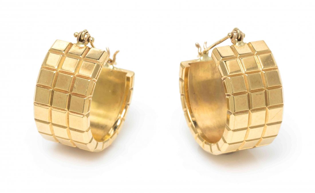 A Pair of 18 Karat Yellow Gold Half Hoop Earrings,: A Pair of 18 Karat Yellow Gold Half Hoop Earrings, Chopard, in a repeated square texture design. Stamp: 3054547 82/3803 Chopard. 15.00 dwts.
