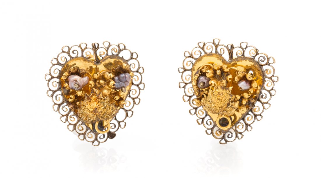 A Pair of Antique Yellow Gold and Pearl Earrings, 3.20: A Pair of Antique Yellow Gold and Pearl Earrings, in a heart shape design with textured foliate and wirework accents and containing four baroque pink pearls, later hinged 14 karat backs. 3.20 dwts.