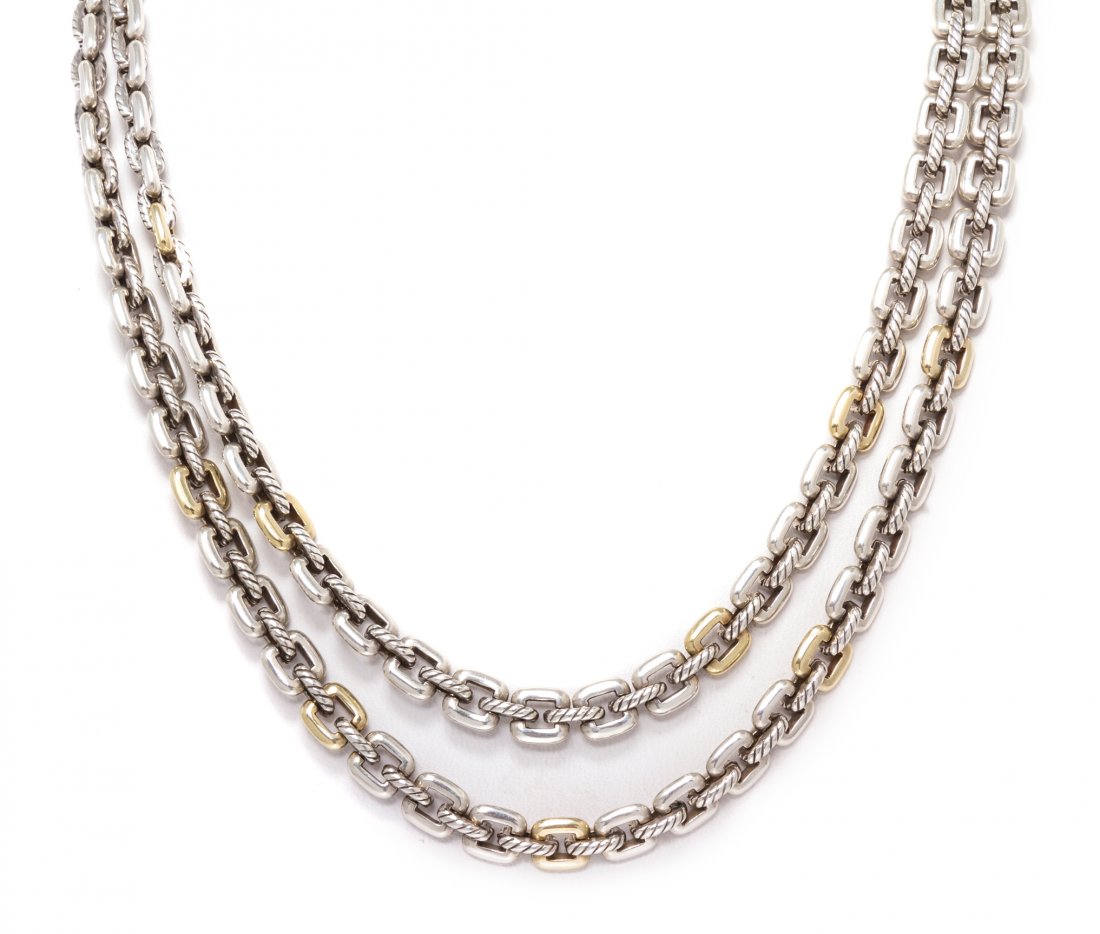 A Sterling Silver and 18 Karat Yellow Gold Necklace,: A Sterling Silver and 18 Karat Yellow Gold Necklace, David Yurman, consisting of a silver double row square link necklace with yellow gold accent links. Stamp: 925 750 D.Y. (David Yurman maker's mark)