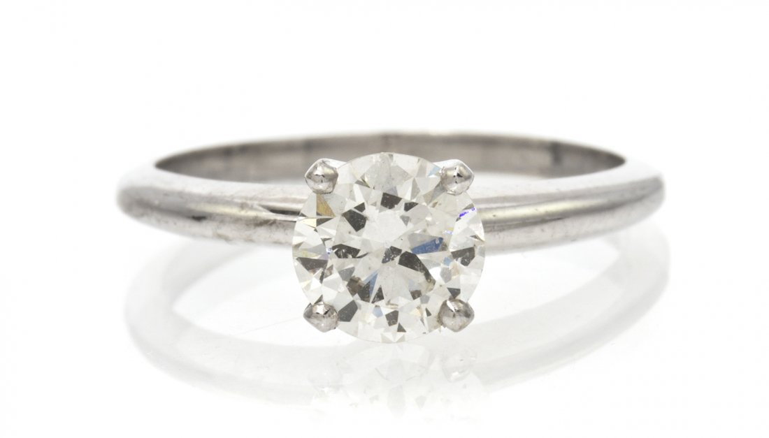 A 14 Karat White Gold and Diamond Solitaire Ring, 1.60: A 14 Karat White Gold and Diamond Solitaire Ring, containing one transitional brilliant cut diamond weighing approximately 0.78 carat. Stamp: 14K. 1.60 dwts. Property from the Collection of Stan Krand