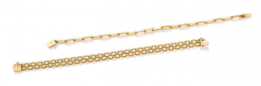 A Collection of 14 Karat Yellow Gold Link Bracelets,: A Collection of 14 Karat Yellow Gold Link Bracelets, consisting of one oval link bracelet and one textured link bracelet. Stamp: 14K. 19.30 dwts. Property from the Estate of Gertrude A. Freund, Naples