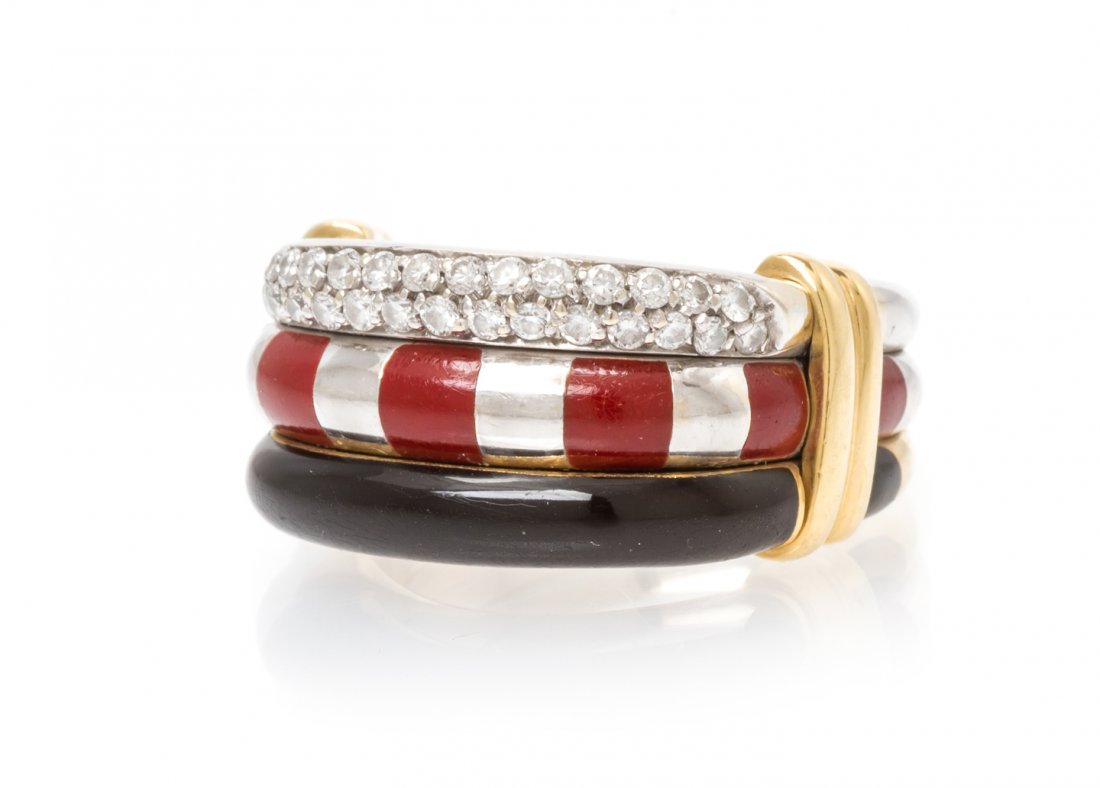 An 18 Karat Gold, Polychrome Enamel and Diamond Stacked: An 18 Karat Gold, Polychrome Enamel and Diamond Stacked Ring, consisting of three separate white gold rings banded together at the sides with fluted yellow gold accents, one ring containing numerous r