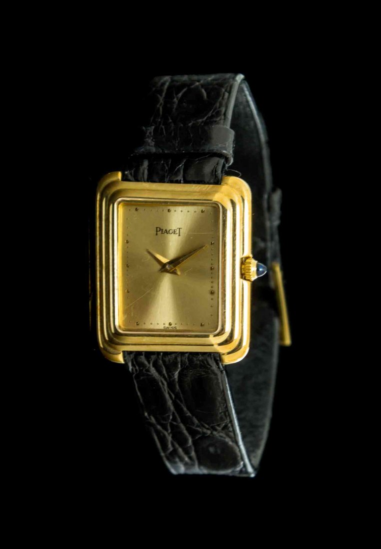 An 18 Karat Yellow Gold Ref. 44101 Wristwatch, Piaget,: An 18 Karat Yellow Gold Ref. 44101 Wristwatch, Piaget, 27.00 x 23.00 mm case dimensions, matte gold dial signed PIAGET, applied gold dot numerals, gold dauphine hands, fluted rectangular bezel, case b