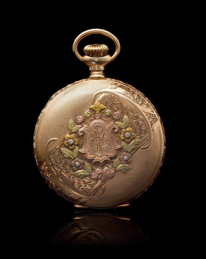 A 14 Karat Tricolor Gold Hunter Case Pocket Watch,: A 14 Karat Tricolor Gold Hunter Case Pocket Watch, Elgin, Circa 1900, 33.00 mm case diameter, white porcelain dial, Roman numerals, blued steel spade hands, subdial for seconds at 6 o'clock, rose gold