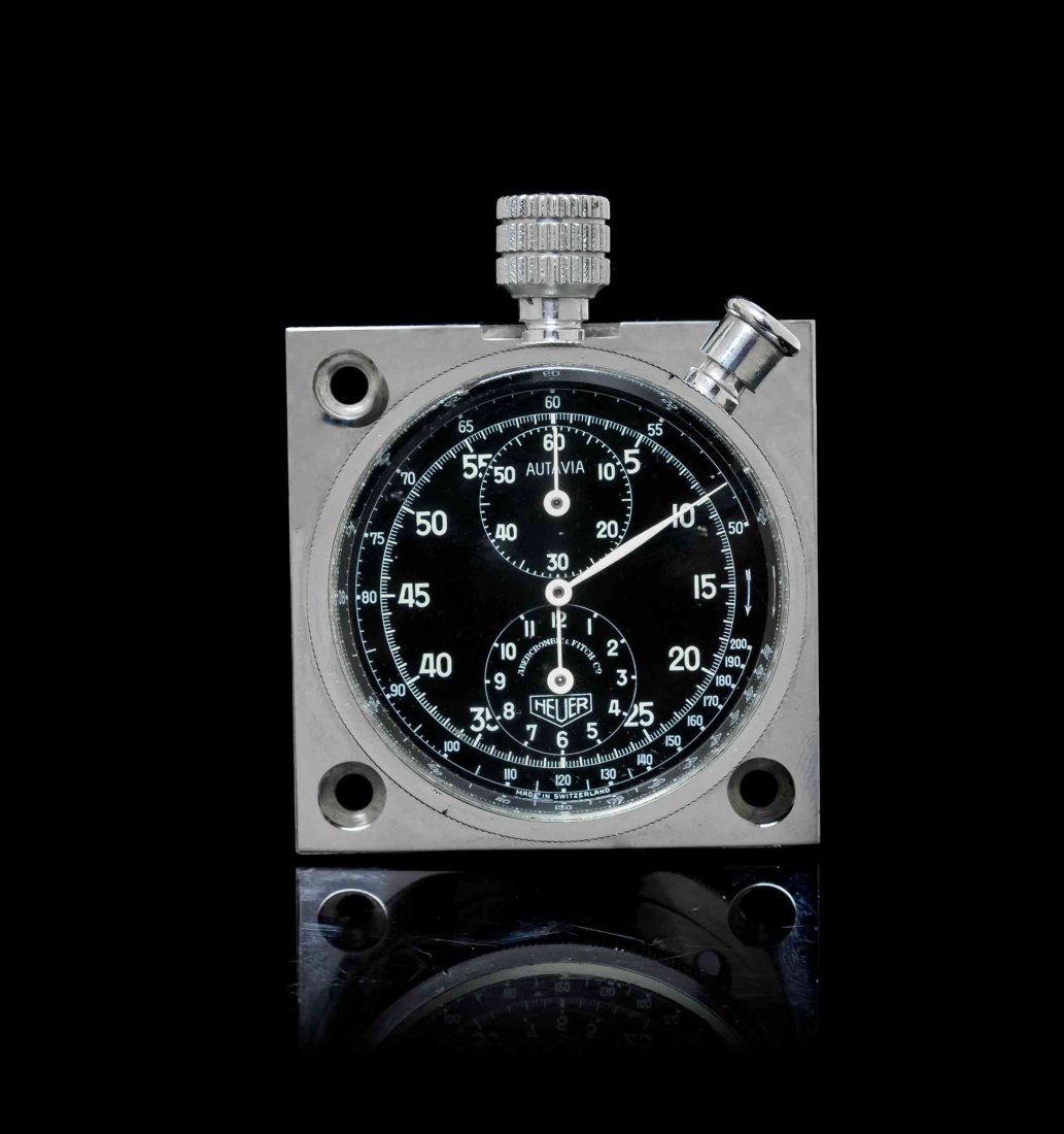 A Stainless Steel Autavia Dashboard Laptimer Stopwatch,: A Stainless Steel Autavia Dashboard Laptimer Stopwatch, Heuer for Abercrombie & Fitch Co., 54.00 mm case diameter affixed with three screws to the 58.00 x 58.00 mm backplate drilled with three apertur