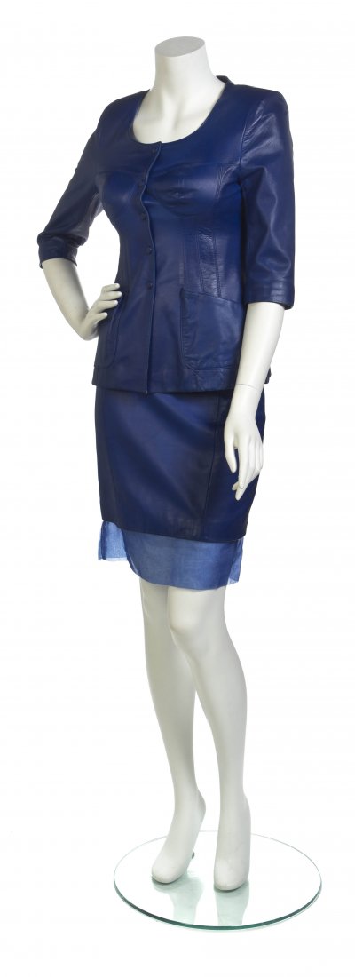 A Blue Leather Skirt Ensemble,: A Blue Leather Skirt Ensemble, attribute to Jean-Claude Jitrois, button front jacket with short sleeves, molded bust and two patch pockets, skirt with a sheer hem. Unlabeled.