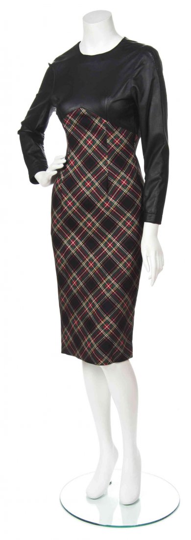 A Todd Oldham Dress Ensemble, Size S.: A Todd Oldham Dress Ensemble, dress with faux leather bodice and plaid wool bottom, together with a black wool peacock coat. Labeled: Todd Oldham. Size S.