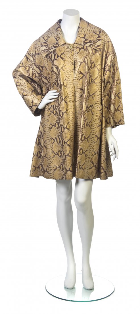 A Mario Valentino Faux Snakeskin Leather Swing Coat,: A Mario Valentino Faux Snakeskin Leather Swing Coat, single button the collar with two patch pockets. Labeled: Mario Valentino. Size 38.