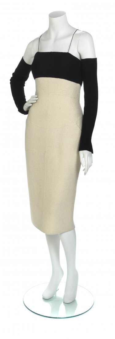 A Chanel Two Tone Black and White Wool Dress, Size 38.: A Chanel Two Tone Black and White Wool Dress, 1999 Automne/Hiver, fitted with camisole straps and a black panel to the bust, together with a pair of black matching arm warmers. Labeled: Chanel. Size 3
