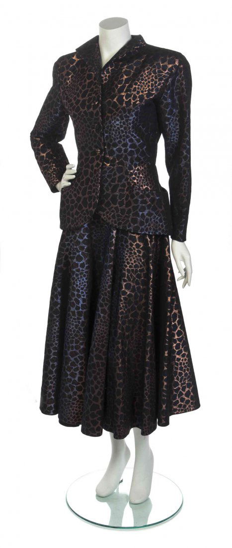 A Vicky Tiel Couture Animal Print Skirt Ensemble,: A Vicky Tiel Couture Animal Print Skirt Ensemble, single breasted jacket, together with a yoke waist skirt. Labeled: Vicky Tiel Couture. Jacket size 42, skirt size 40.