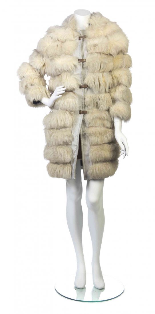 An Ivory Leather and Fox Fur Coat & Hat,: An Ivory Leather and Fox Fur Coat & Hat, with front latch closures. Labeled: Maple Furriers.