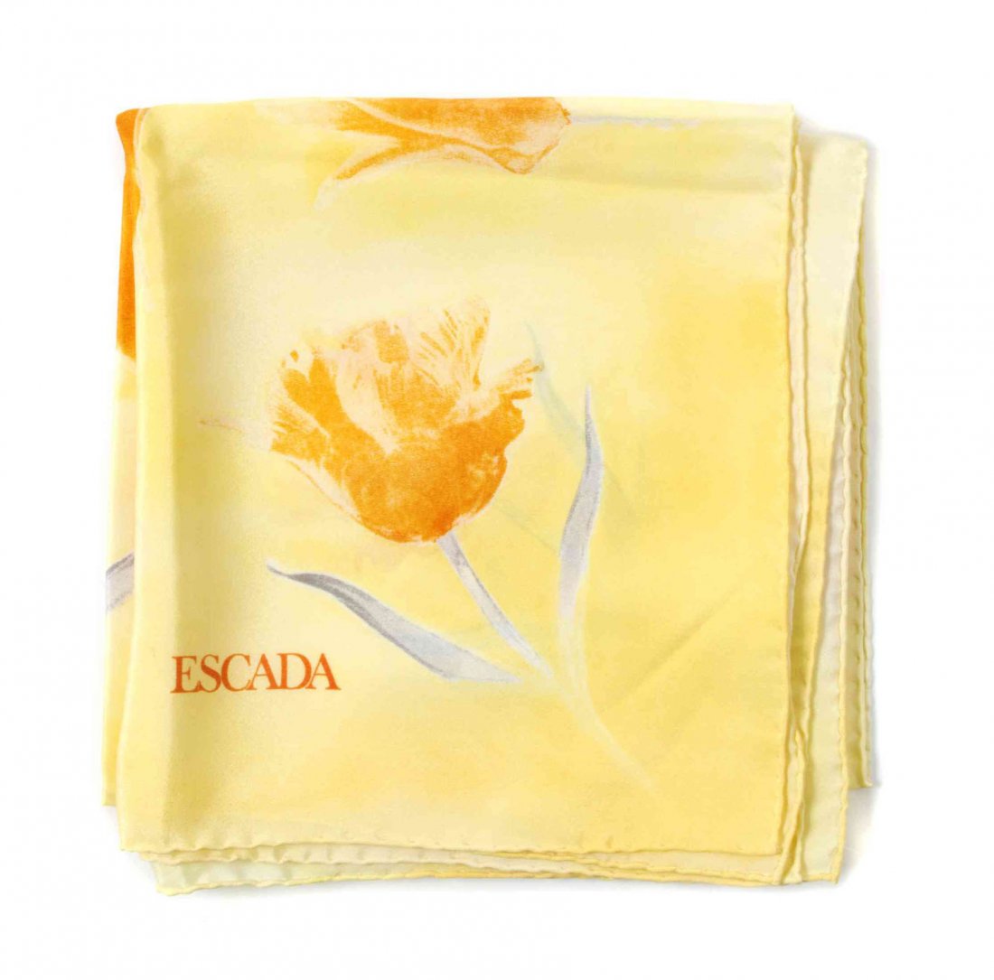 An Escada Silk Scarf, 35 x 35 inches.: An Escada Silk Scarf, in a poppies motif. Labeled within print: Escada 35 x 35 inches. Property from the Estate of Louis M. and Linda M. Byron, Tucson, Arizona