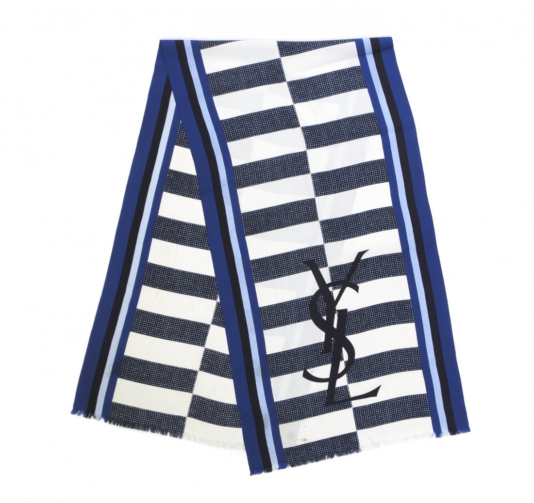 An Yves Saint Laurent Blue Silk Scarf,: An Yves Saint Laurent Blue Silk Scarf, together with a Richard Allan multicolor floral print scarf, and a Fiorio brown and ivory scarf. All labeled within print.