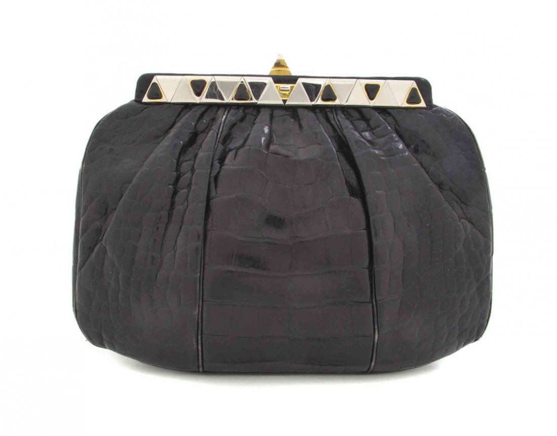 A Judith Leiber Black Alligator Bag, 8 1/2 x 6 3/4 x 3: A Judith Leiber Black Alligator Bag, with a faux onyx frame and clasp, drop-in shoulder strap, with two interior scalloped slip pockets, accessories included. Stamped: Judith Leiber. 8 1/2 x 6 3/4 x 3