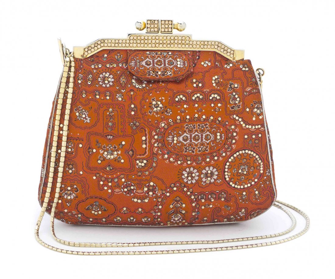 A Judith Leiber Orange Crystal Brocade Bag, 6 3/4 x 6: A Judith Leiber Orange Crystal Brocade Bag, embellished with Swarovski crystals, gold tone decorative crystal studded frame and button closure, drop-in goldtone chain strap, with interior scalloped sl