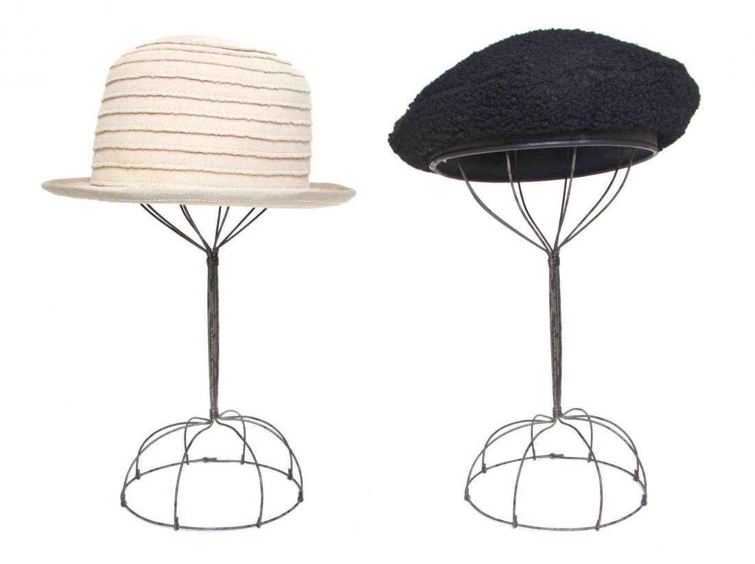 An Hermes Black Lambskin Beret, Size 57.: An Hermes Black Lambskin Beret, together with a Giorgio Armani cream rabbit felt hat. Each labeled: Hermes and Giorgio Armani. Size 57.
