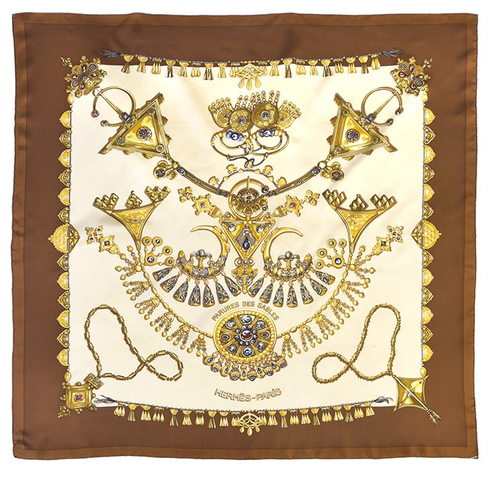 An Hermes Silk Scarf, 34.5 x 34.5 inches.: An Hermes Silk Scarf, in a 'Parures des Sables' motif. Labeled within print: Hermes. 34.5 x 34.5 inches. Property from the Collection of Mr. and Mrs. Robert Phillips, Chicago, Illinois