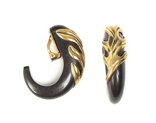 A Pair of Isabel Canovas Wood Earclips,: A Pair of Isabel Canovas Wood Earclips, with a goldtone leaf applique. Stamped: Isabel Canovas.