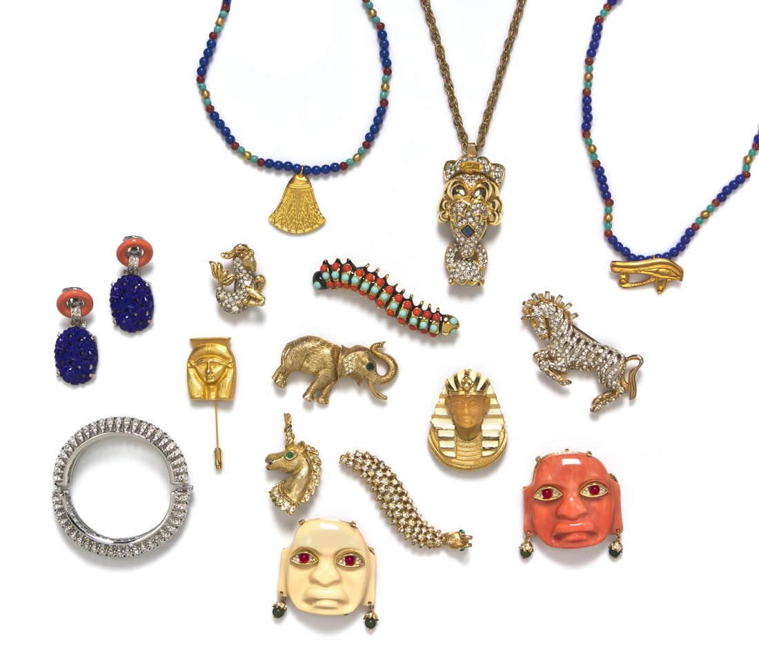 A Group of Kenneth Jay Lane Costume Jewelry,: A Group of Kenneth Jay Lane Costume Jewelry, comprised of 10 brooches, three necklaces, a rhinestone hinged bangle bracelet, and a pair of earclips. All stamped. Property from an Important Collector, 