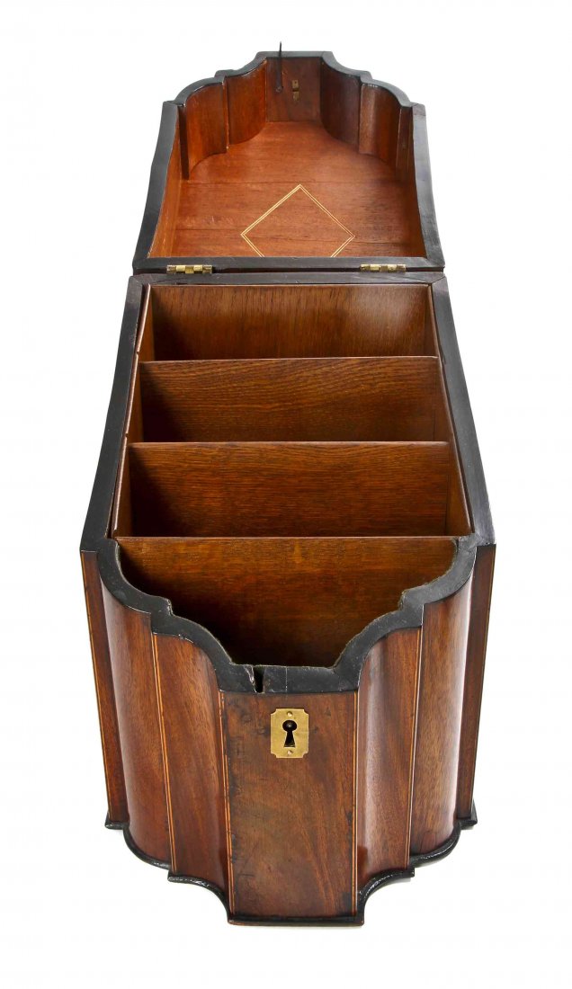 A George III Fruitwood Strung Mahogany Knife Box,: A George III Fruitwood Strung Mahogany Knife Box, circa 1800, sloped hinged lid with ogee front, rectangular case, with Sheffield plate lid hardware, and brass escutcheon, interior later modified in o