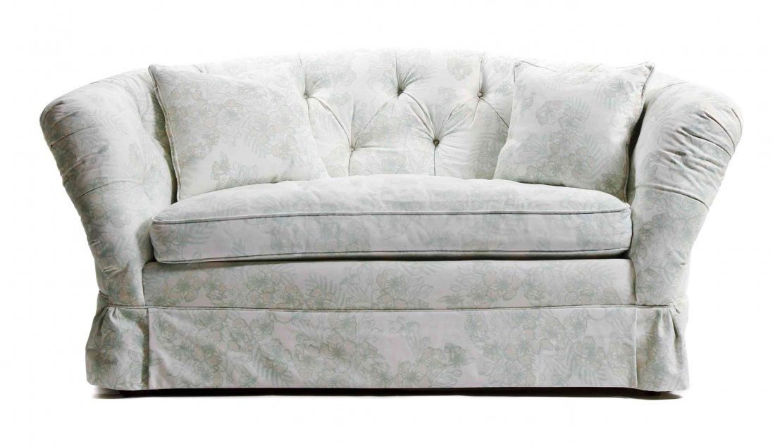 A Pair of Baker Furniture Upholstered Settees, Height: A Pair of Baker Furniture Upholstered Settees, having curved backrest with tufted upholstery of pale green and taupe floral-printed Bahamian canvas with cream ground. Height 34 x width 69 1/2 x depth