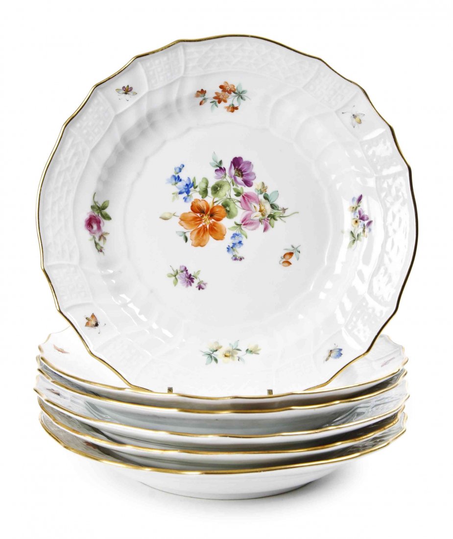 A Set of Six Meissen Porcelain Luncheon Plates,: A Set of Six Meissen Porcelain Luncheon Plates, painted with scattered floral bouquets and insects, with shaped and molded rim with gilt edge, with underglaze blue crossed swords mark with pommels. Di