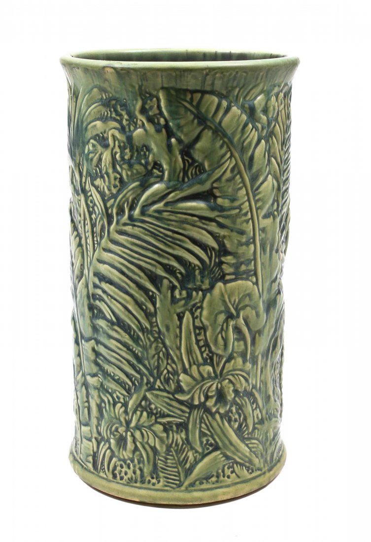 A Weller Marvo Pottery Umbrella Stand, Height 19: A Weller Marvo Pottery Umbrella Stand, unmarked, with matte green glaze, molded with leaves, cylindrical form. Height 19 inches.