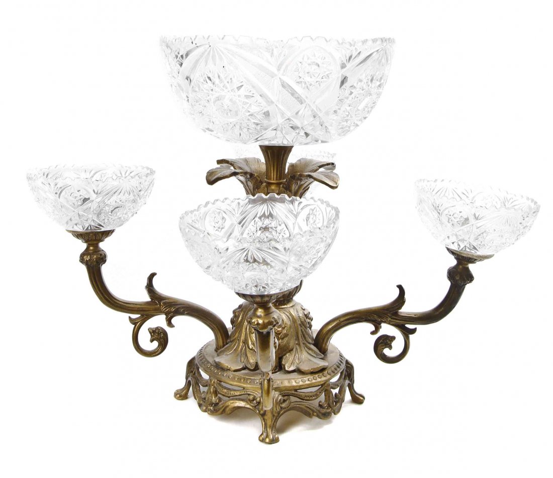 A Gilt Metal and Cut Glass Mounted Epergne, Height 13: A Gilt Metal and Cut Glass Mounted Epergne, 20th century, fitted with central press-molded and colorless cut glass bowl, the gold-finished white metal stand with flat leaf stem and four scrolled arms 