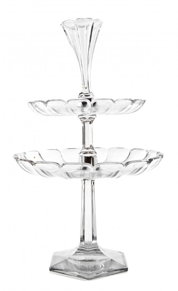 A Heisey Colorless Glass Epergne, Height 23 inches.: A Heisey Colorless Glass Epergne, with central vase over two graduated tiers with scalloped rims, on hexagonal foot. Height 23 inches.