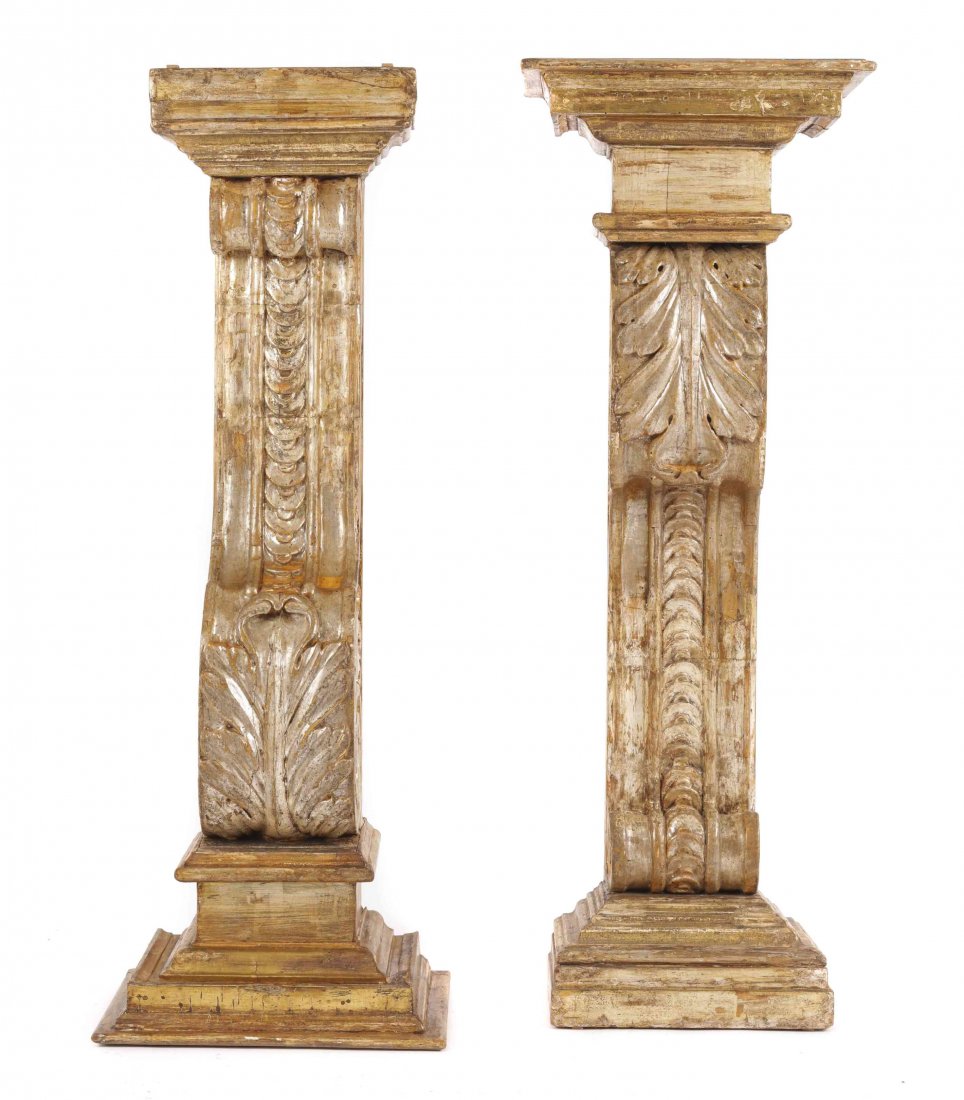A Pair of Italian Carved, Painted, and Parcel Gilt: A Pair of Italian Carved, Painted, and Parcel Gilt Corbel Pedestals, composed of antique elements, the acanthus-carved architectural corbel topped by a rectangular cap, and set atop a tiered base. Hei