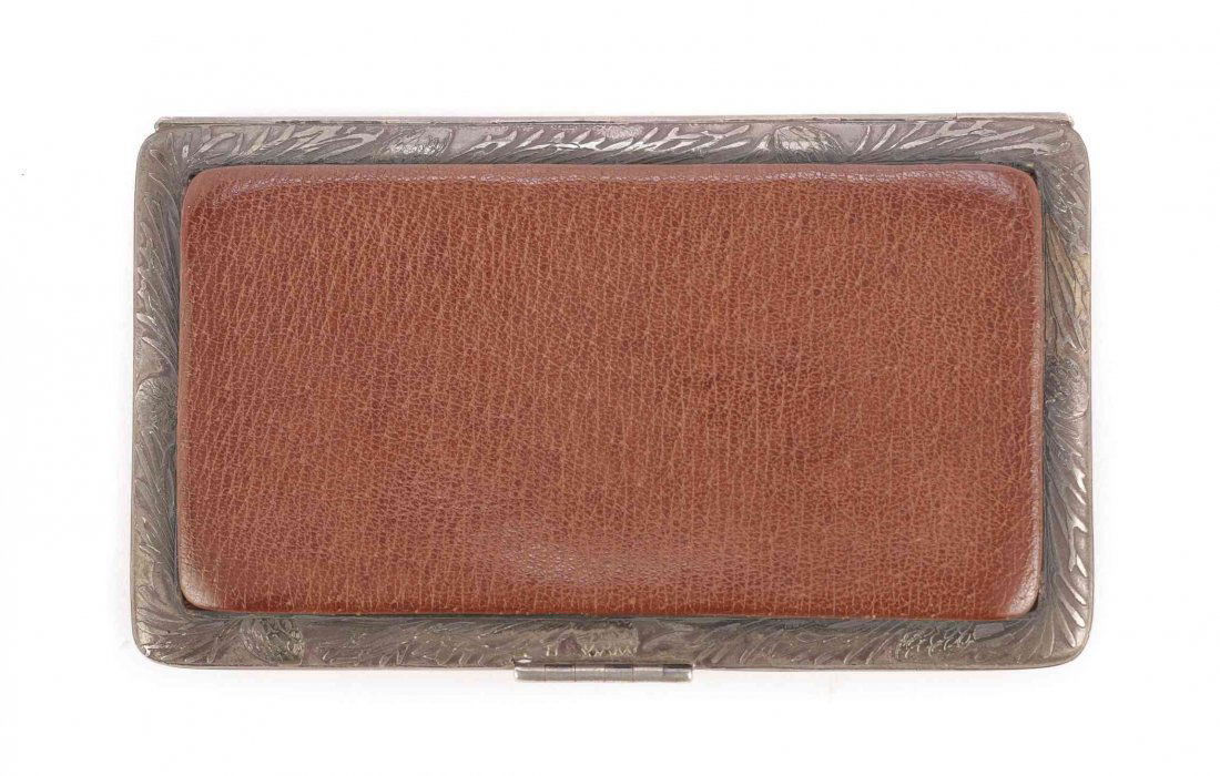 An American Silver and Leather Card Case, Tiffany &: An American Silver and Leather Card Case, Tiffany & Co., New York, NY, 1873-1891, the silver frame etched with pine cones and pine needles, exterior brown pebbled calf, interior with tan calf. Length