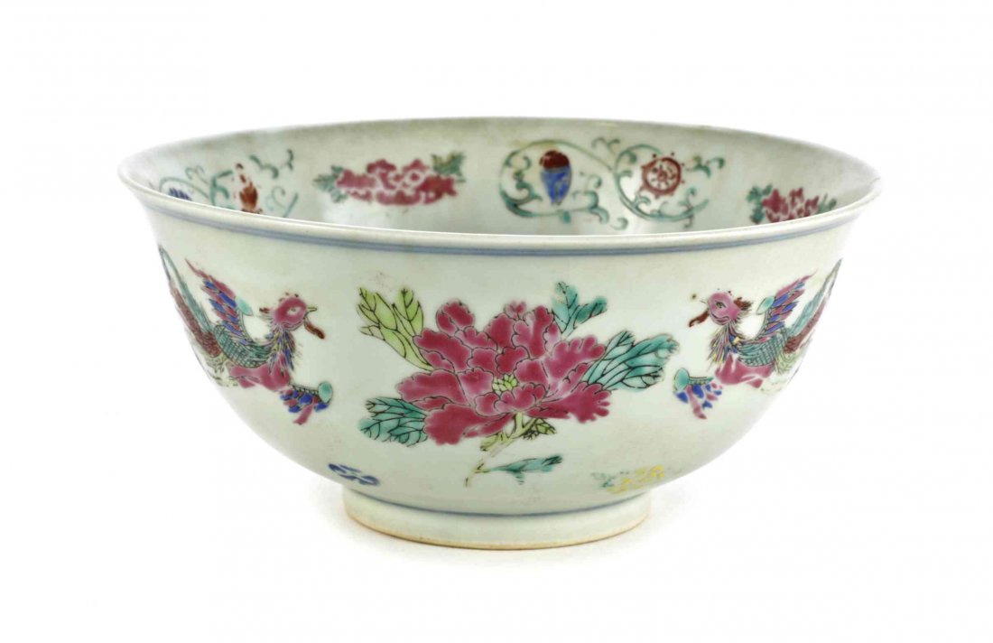 A Famille Rose Porcelain Bowl, Diameter of 8 1/4: A Famille Rose Porcelain Bowl, decorated with two writhing dragons and a border of bajixiang to the interior, having phoenix decoration to the exterior, bearing a Yongzheng reign mark to the underside
