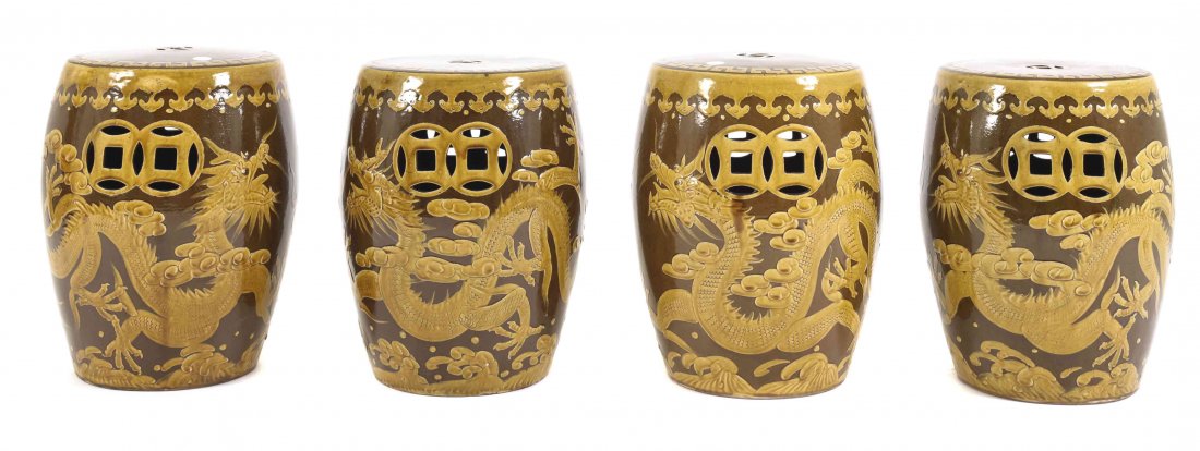 A Group of Four Chinese Pottery Garden Seats, Height 18: A Group of Four Chinese Pottery Garden Seats, with brown and ochre glazing and dragon decoration. Height 18 inches. Property of a Palm Beach Estate