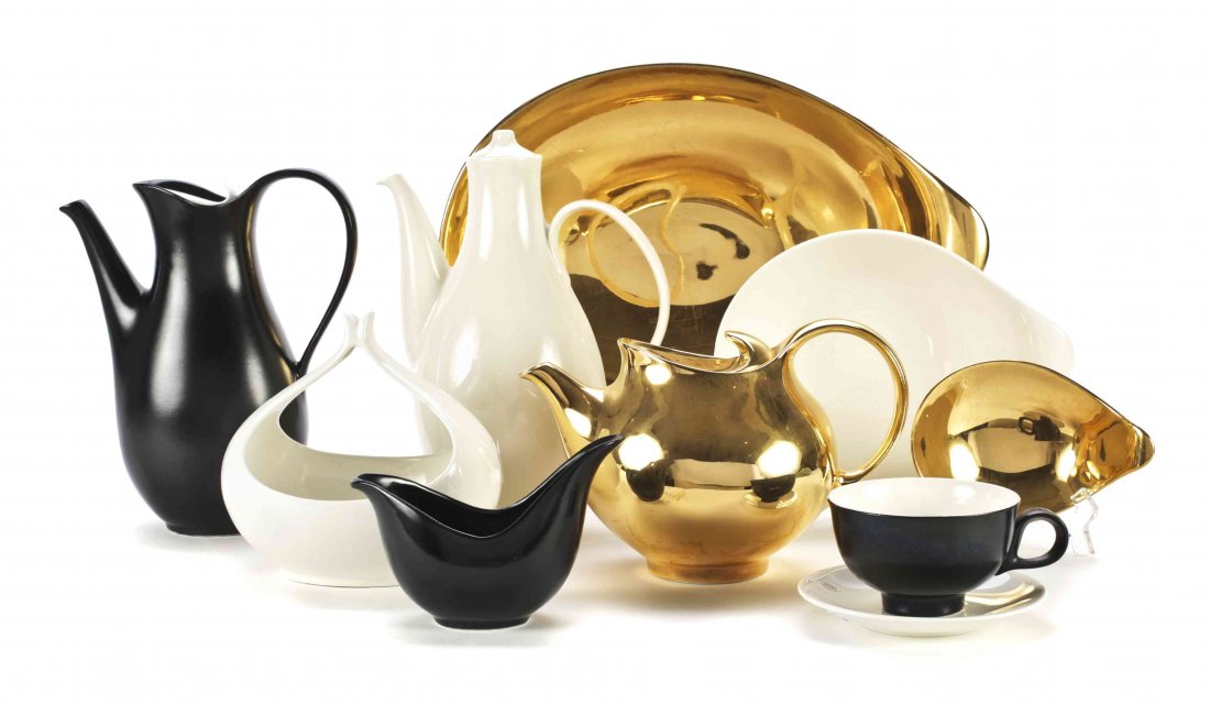 An Eva Zeisel Ceramic Partial Dinner Service, Length of: An Eva Zeisel Ceramic Partial Dinner Service, manufactured by Hall and Bryce, in the Tomorrow's Classic pattern, comprising a teapot, coffee pots, pitchers, creamers, covered sugars, salt and pepper s