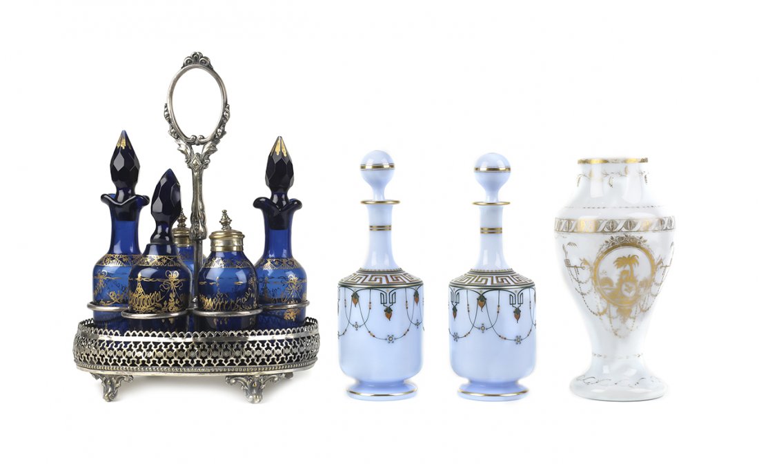 A Group of Enamel-Decorated Glass Articles,: A Group of Enamel-Decorated Glass Articles, 19th century, comprising a pair of pale blue Bristol glass cologne bottles with round stoppers and polychrome decoration, a white opaline vase with gold dec