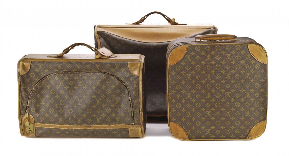 A Group of Three Louis Vuitton Luggage Pieces,: A Group of Three Louis Vuitton Luggage Pieces, comprising two softsided suitcases and one folding garment bag.