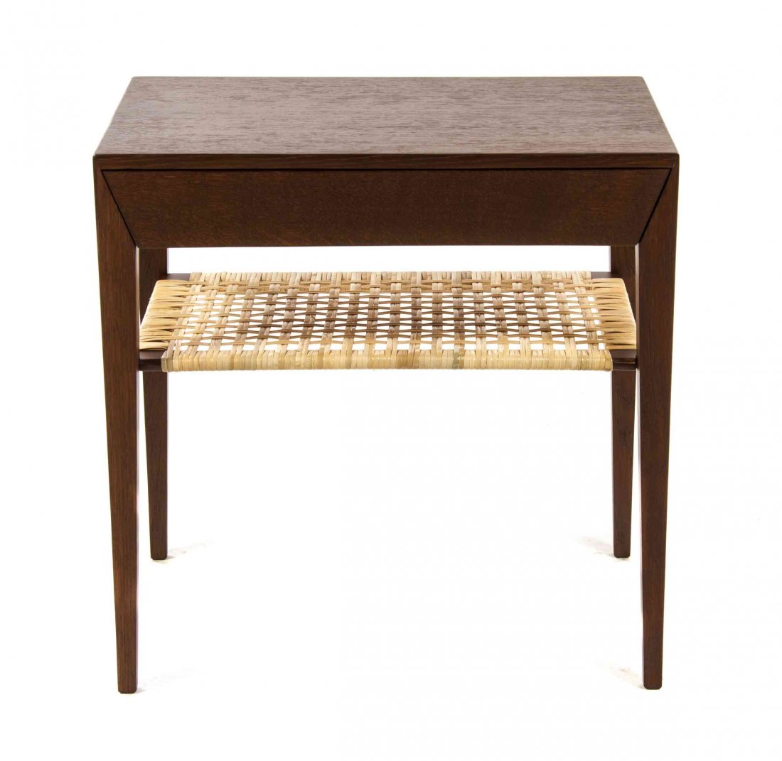 A Danish Teak Occasional Table, Severin Hansen, Height: A Danish Teak Occasional Table, Severin Hansen, having a rectangular top over a long drawer, raised on tapering legs joined by a rattan medial shelf, bearing Danish control label. Height 19 3/4 x widt