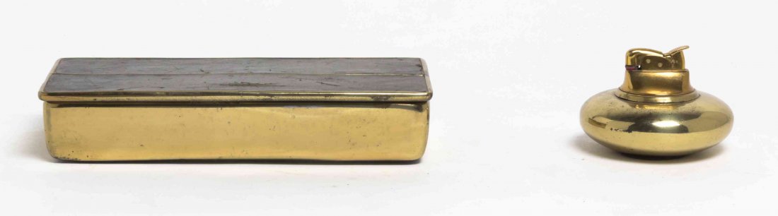 A Jenfred Leather Inset Brass Cigarette Box, Raymor,: A Jenfred Leather Inset Brass Cigarette Box, Raymor, having a rectangular lift lid, opening to a cork lined interior. Width 8 1/4 inches. Property from the Estate of Reva Duman, Highland Park, Illinoi