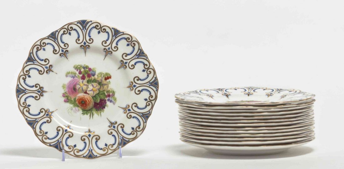 A Set of Eleven Royal Worcester Luncheon Plates,: A Set of Eleven Royal Worcester Luncheon Plates, decorated in the Imari taste, together with three Copeland plates decorated with floral sprays. Diameter of first 9 inches.