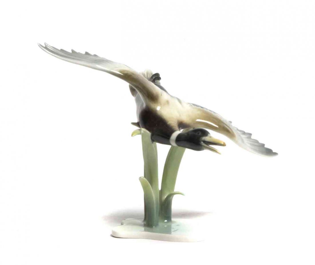 A Bavarian Porcelain Model of a Duck, Height 5 3/4: A Bavarian Porcelain Model of a Duck, Alka Kunst, depicted in flight. Height 5 3/4 inches.