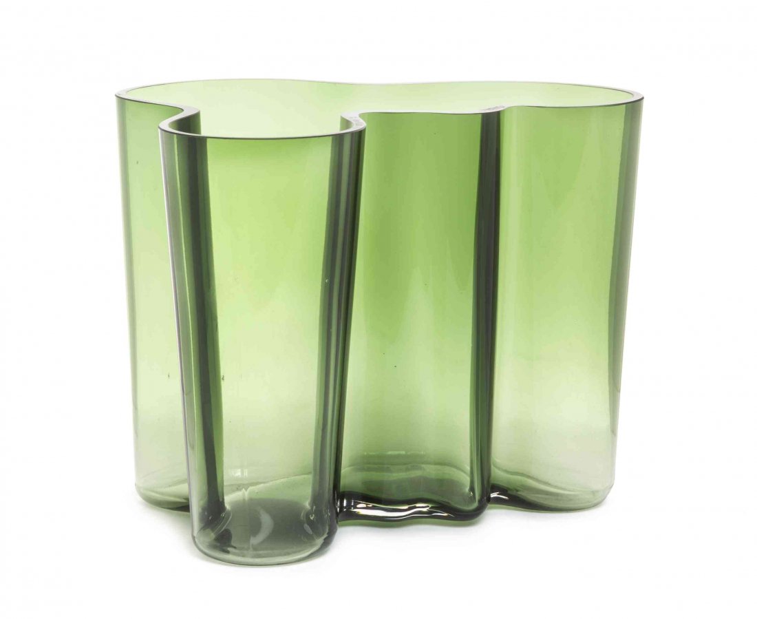 An Alvar Aalto Glass Savoy Vase, (Finnish, 1898-1976),: An Alvar Aalto Glass Savoy Vase, (Finnish, 1898-1976), the green glass of shaped form, etched A. Aalto Italia 1936-1986 E 800/ 8000. Height 6 1/2 inches.