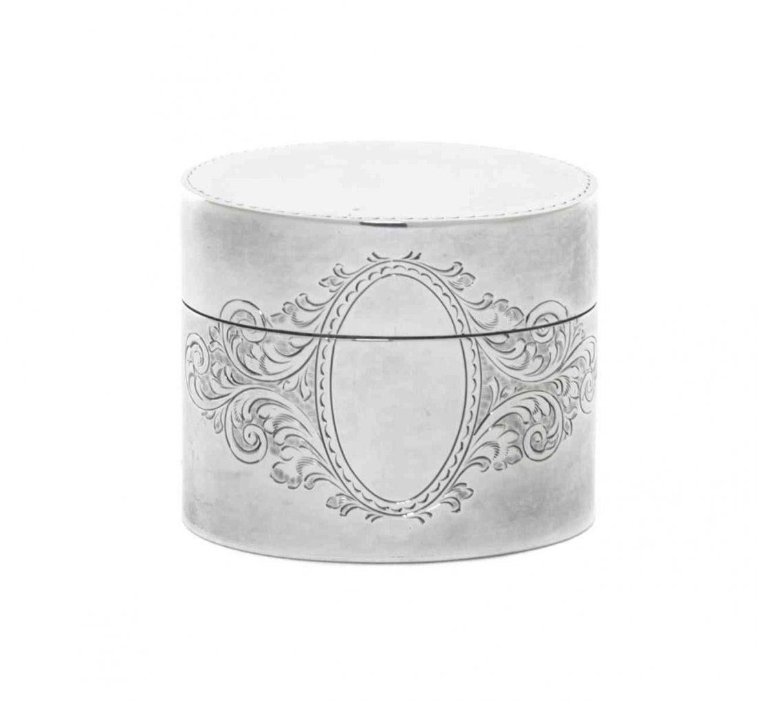 An English Silver Box, Charles S. Green & Co. Ltd.,: An English Silver Box, Charles S. Green & Co. Ltd., Birmingham, together with an Elizabeth II silver mounted cut glass decanter by Albert Edward Jones, Birmingham; 2 ozt 10 dwt weighable. Width 1 7/8 