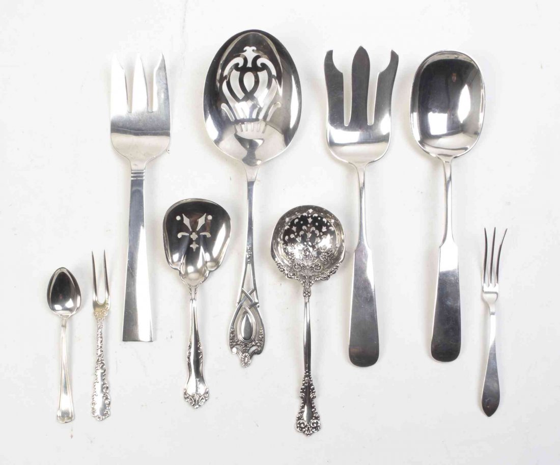 A Group of American Silver Flatware Servers, 19th-20th: A Group of American Silver Flatware Servers, 19th-20th Century, including salad servers, sugar spoons, sugar tongs, demitasse spoons, lemon forks and serving spoons, various patterns and makers, Alan 