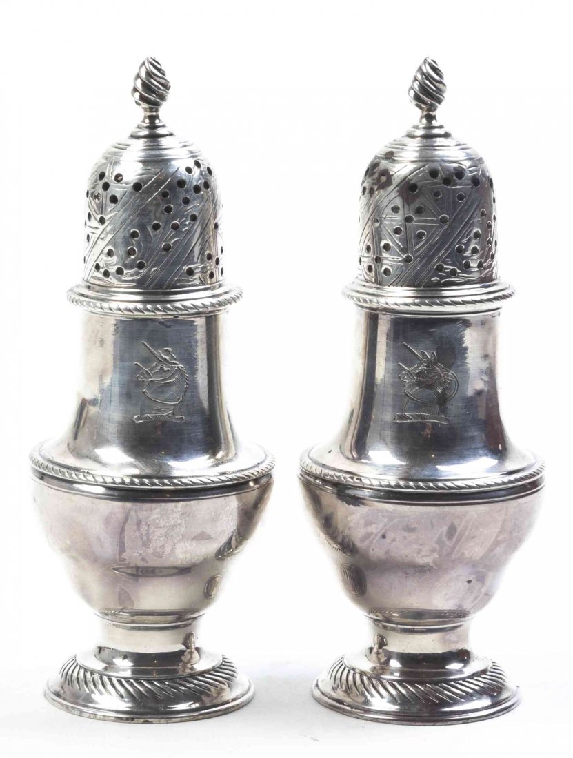 A Pair of George III Silver Casters, Jabez & Thomas: A Pair of George III Silver Casters, Jabez & Thomas Daniel, London, 1772, baluster form, each engraved with a unicorn; 4 ozt 16 dwt. Height 4 3/8 inches. Property from the Estate of Gertrude Wells Bre