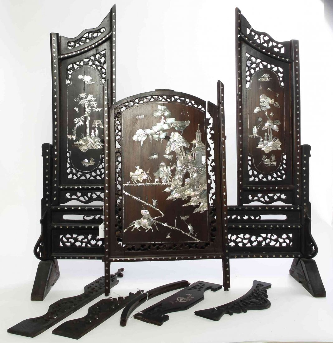 A Chinese Mother-of-Pearl Inlaid Table Screen, Height: A Chinese Mother-of-Pearl Inlaid Table Screen, depicting various figural and landscape scenes. Height approximately 34 x width approximately 31 inches. Property from the Collection of Ed and Dolores H